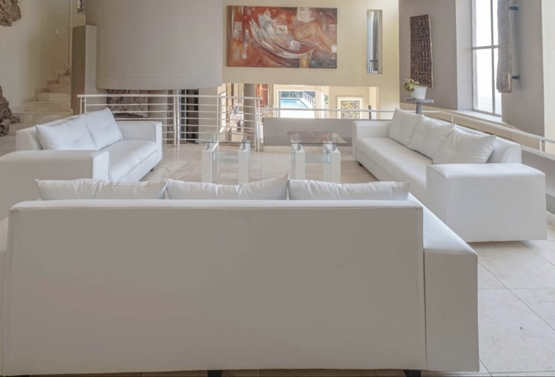 White lounge seating arranged on Cliffside's raised mezzanine